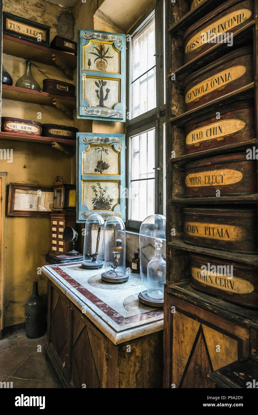Chest of drawers containing ingradients near a window of the back room of the old Pharmacy and Apothecary 'Farmacia di S. Maria della Scala' in Piazza della Scala in Trastevere quarter, Rome, Italy Stock Photo