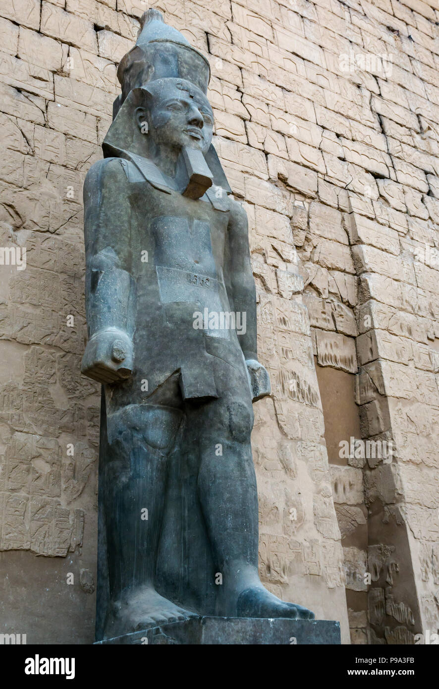 Colossi figure of Ramses II at entrance outer pylon, Luxor Temple, Luxor, Egypt, Africa Stock Photo