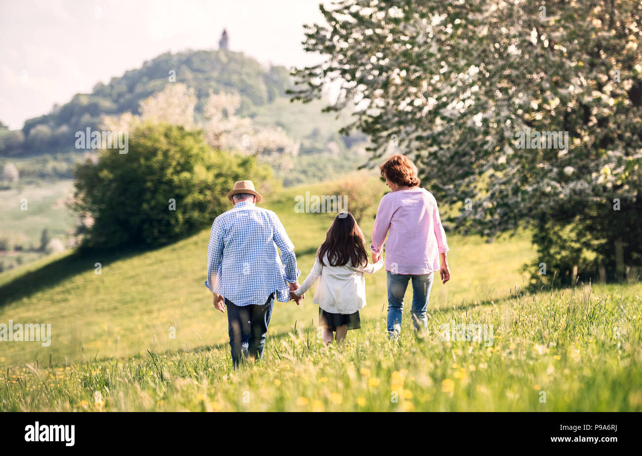 Old man walking small child hi-res stock photography and images - Alamy