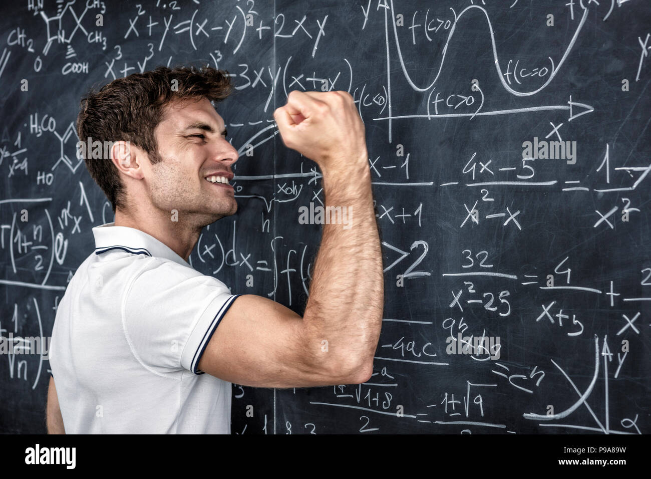 portrait of stressed student and blackboard Stock Photo