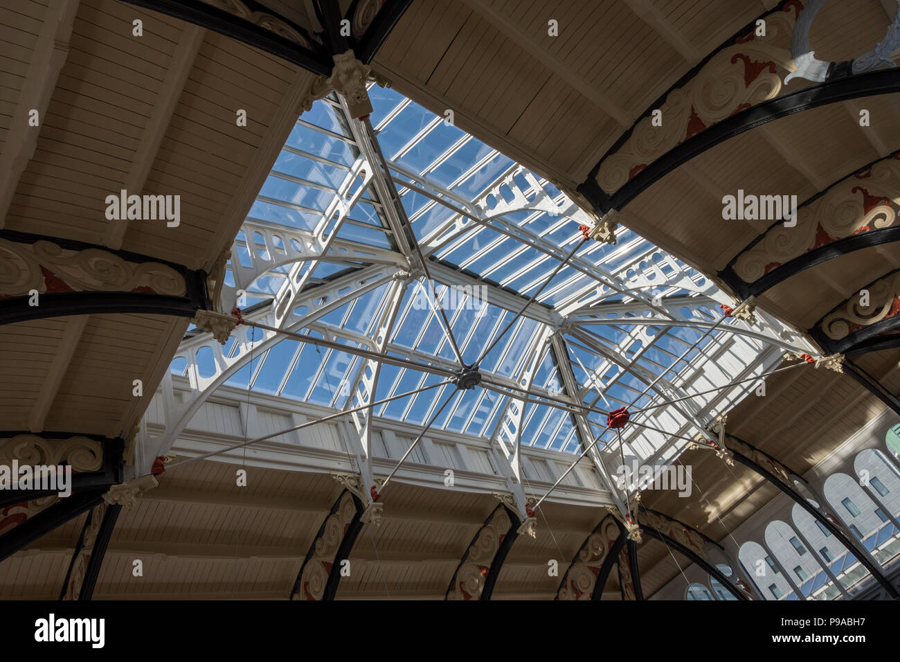 The glass roof of the Mackie Mayor building, a former Victorian meat market, now a food and drink outlet, Northern Quarter, Manchester, England, UK Stock Photo