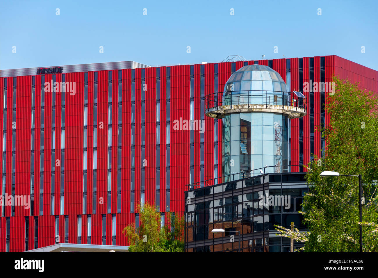 The Innside Hotel building at First Street with the tower of the No 1