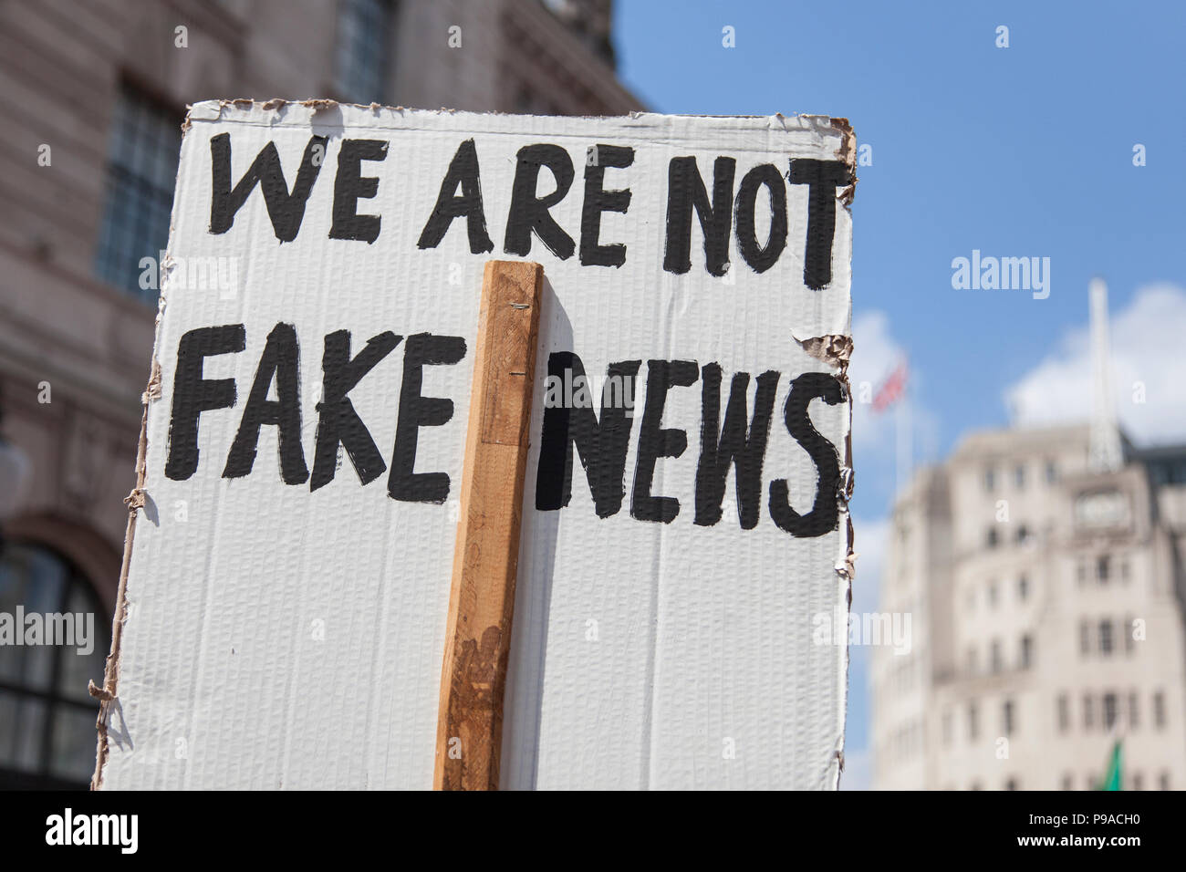 We are not fake news political banner at a protest march Stock Photo