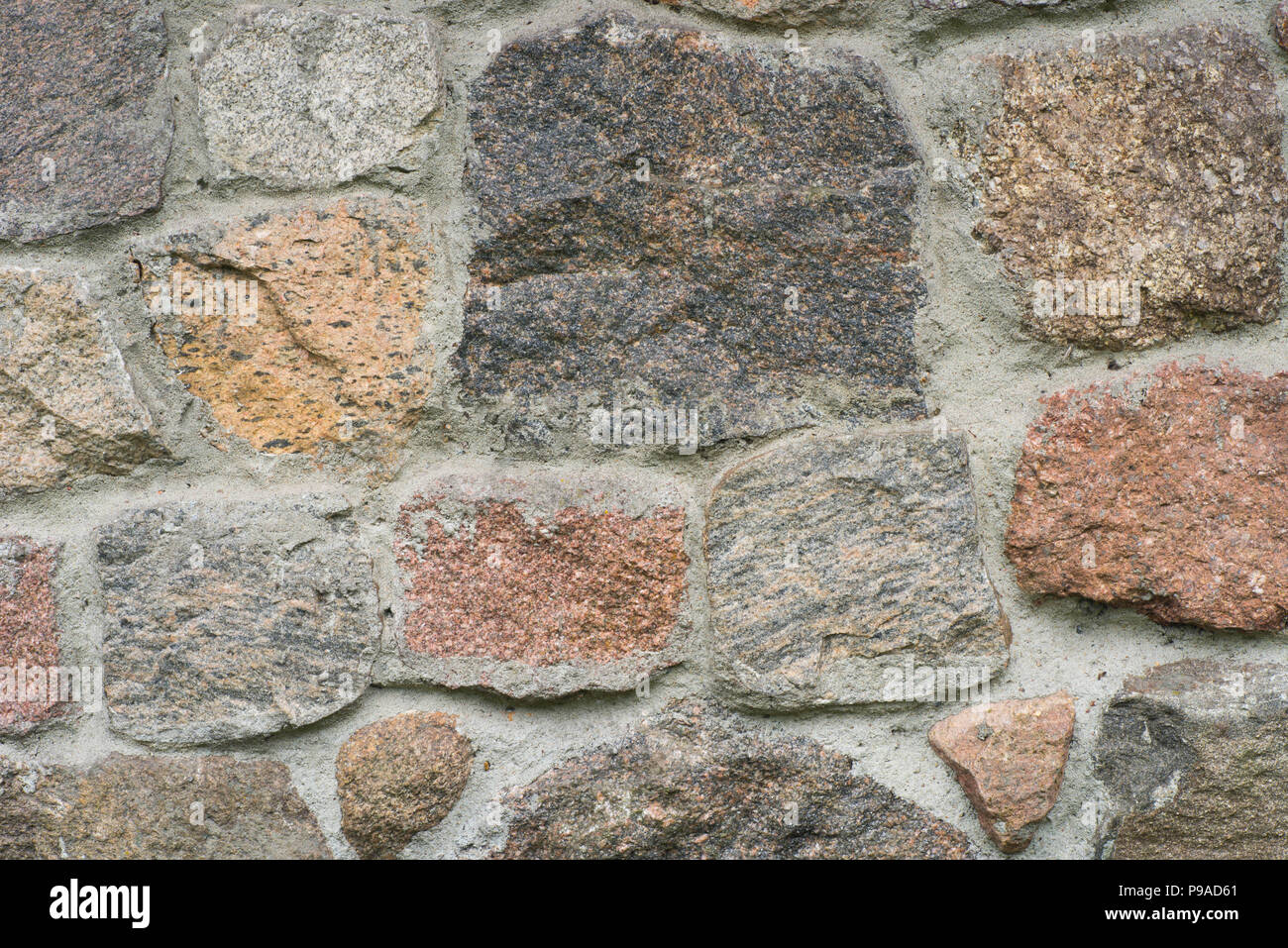 granite stone wall texture background Stock Photo - Alamy
