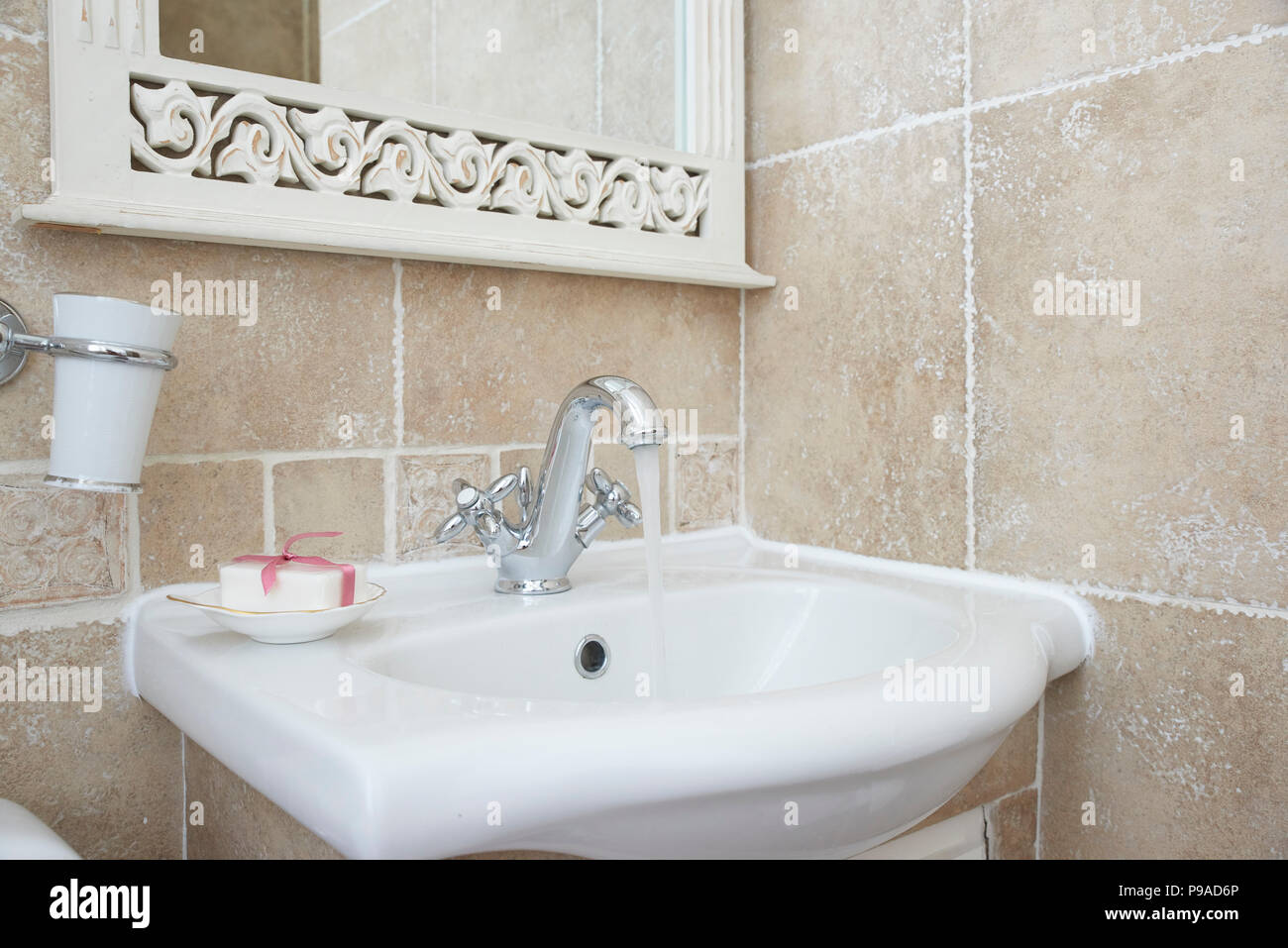 Shot Of Interior Of Bathroom With Sink Basin Faucet Open Chrome