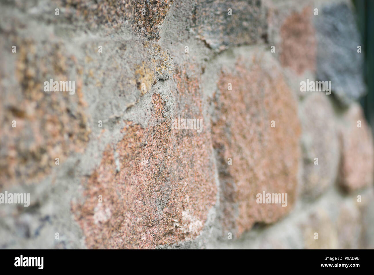 granite stone wall texture background Stock Photo - Alamy