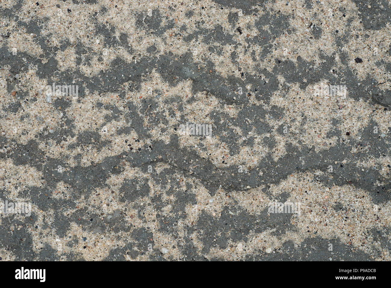 sandy soil ground background texture closeup Stock Photo