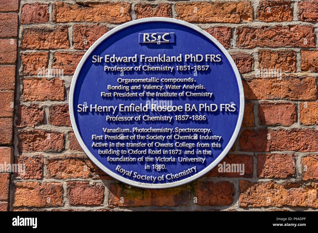 Blue plaque commemorating Sir Edward Frankland and Sir Henry Enfield Roscoe, Professors of Chemistry., Byrom Street, Manchester, England, UK. Stock Photo