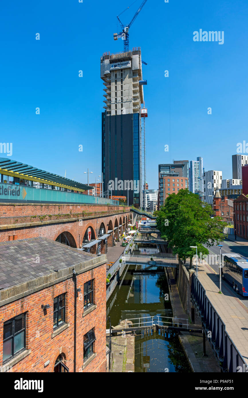 The Axis apartment block under construction, from the Rochdale Canal at
