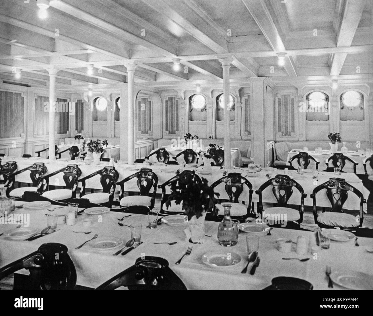 The third class dining area of the Red Star Line's S.S. Zealand, launched on 24 November 1900, making her maiden voyage from Antwerp to New York on 13 April 1901, sailing under the British flag. Stock Photo