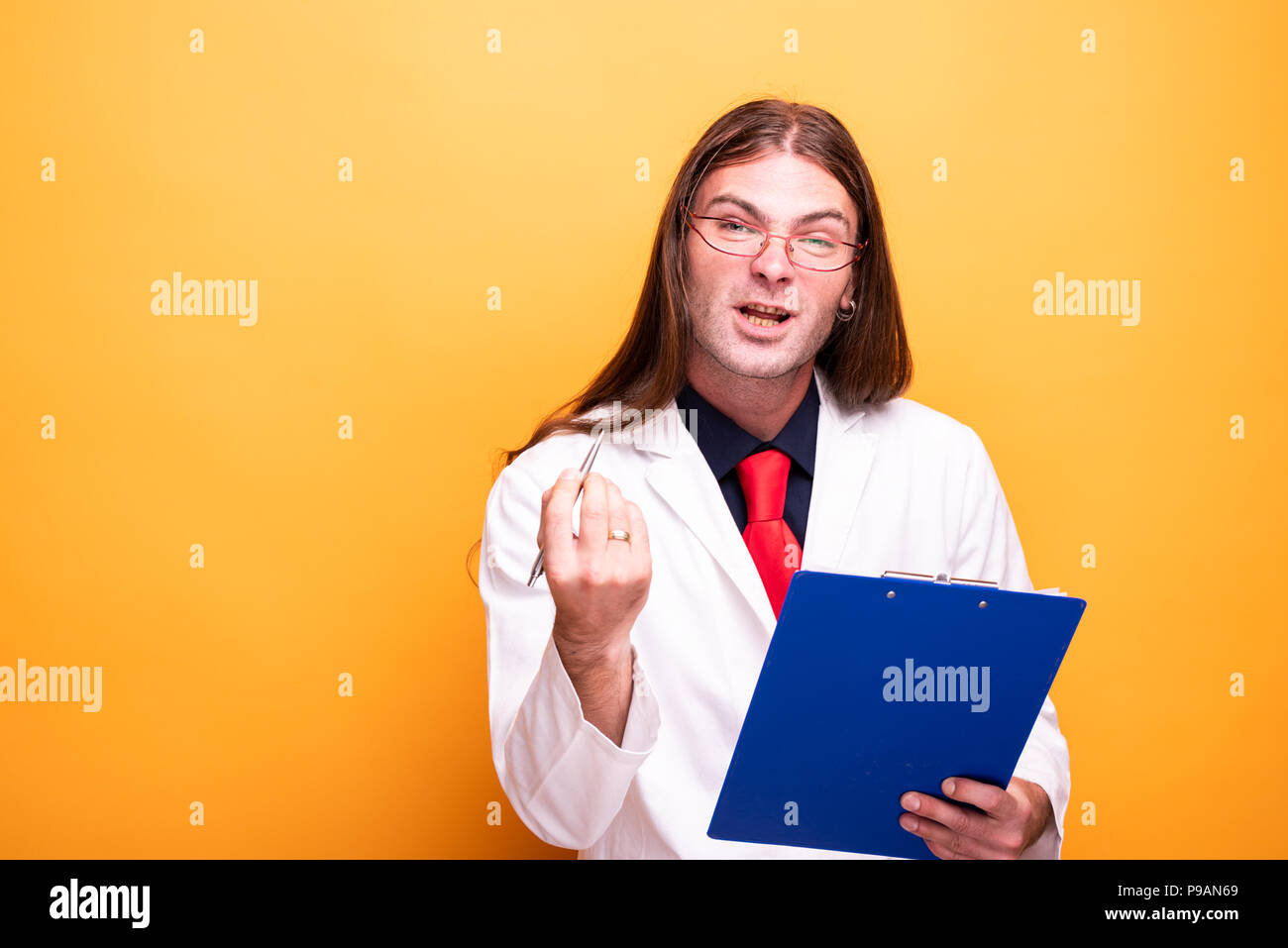 Portrait of adul male doctor explaining in a funny way Stock Photo
