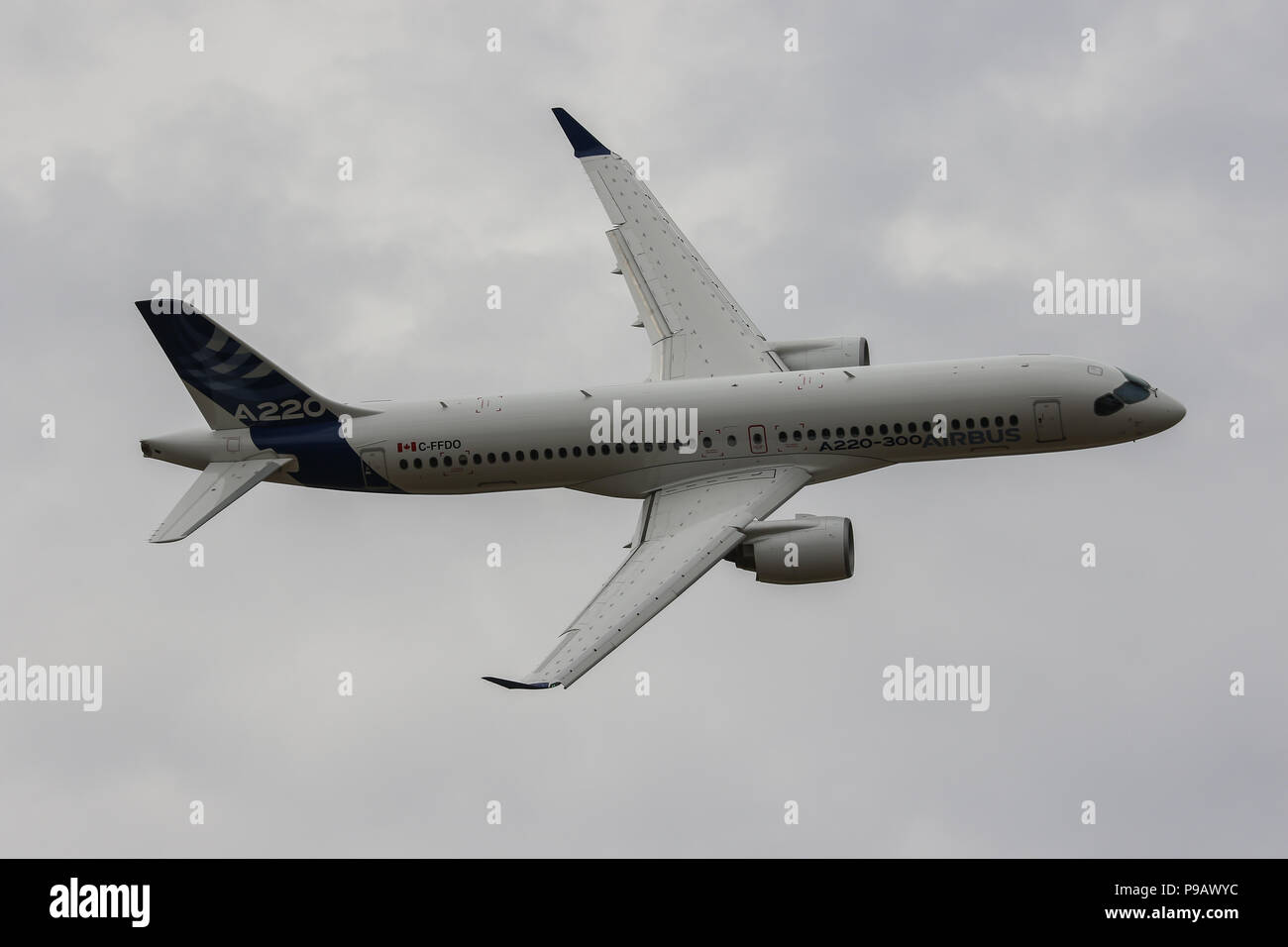 Farnborough, UK. 16th July 2018. An Airbus A220-300 performs in the flying display on the opening day of the 2018 Farnborough International Airshow, one of the biggest aviation trade and industry events in the world, held in the UK. Credit: James Hancock/Alamy Live News Stock Photo