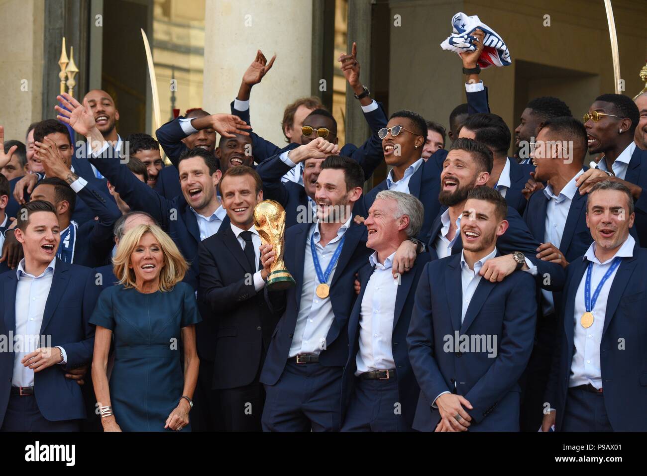 Paris, France. 16th July 2018. French President Emmanuel Macron and his  wife Brigitte Macron welcome the French football team at the presidential  Elysee palace in the wake of its World Cup victory.