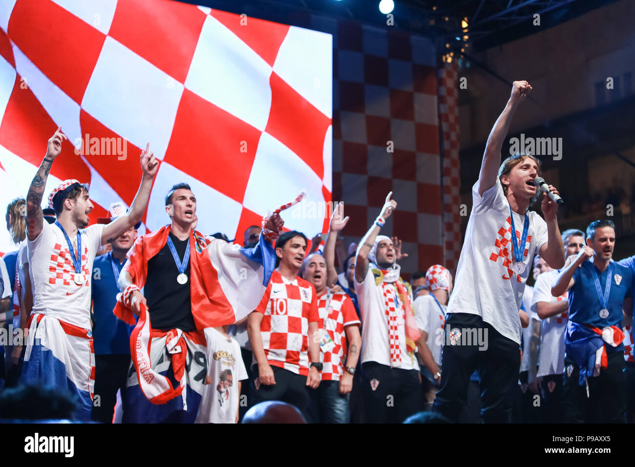 Zagreb, Croatia. 16th July, 2018. Welcome ceremony of Croatian football national team that won 2nd place, silver medal on Fifa World Cup 2018 on Ban Jelacic Square in Zagreb, Croatia. Luka Modric best player on the Fifa World Cup 2018, singing on the stage. Credit: Goran Jakuš/Alamy Live News Stock Photo