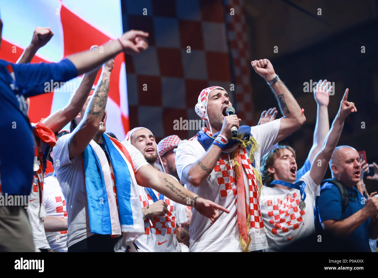 Zagreb, Croatia. 16th July, 2018. Welcome ceremony of Croatian football national team that won 2nd place, silver medal on Fifa World Cup 2018 on Ban Jelacic Square in Zagreb, Croatia. Vedran Corluka is singing on the stage. Credit: Goran Jakuš/Alamy Live News Stock Photo