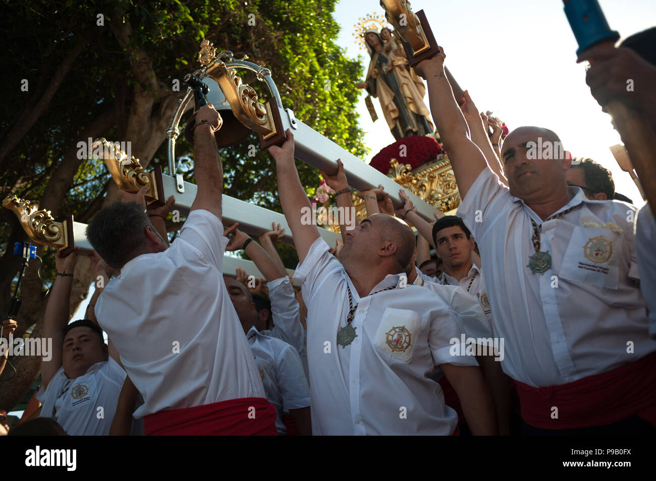 Malaga, Spain. 16th July, 2018. A group of believers of the Virgen del ...