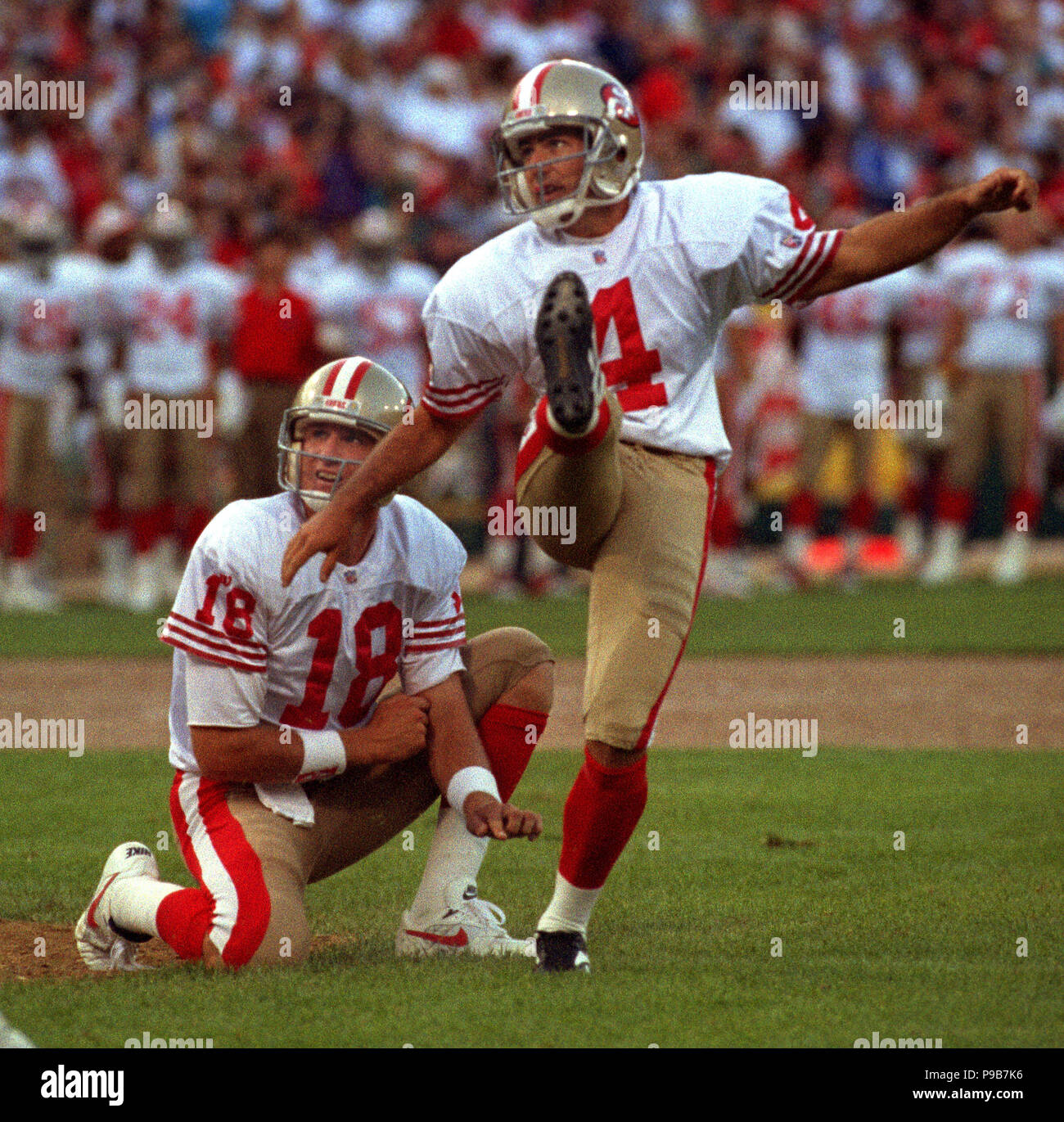 San Francisco, California, USA. 19th Aug, 1995. San Francisco 49ers vs. Carolina  Panthers at Candlestick Park Saturday, August 19, 1995. 49ers beat Panthers  17-10. Carolina Panthers quarterback Frank Reich (14) sacked. Credit: