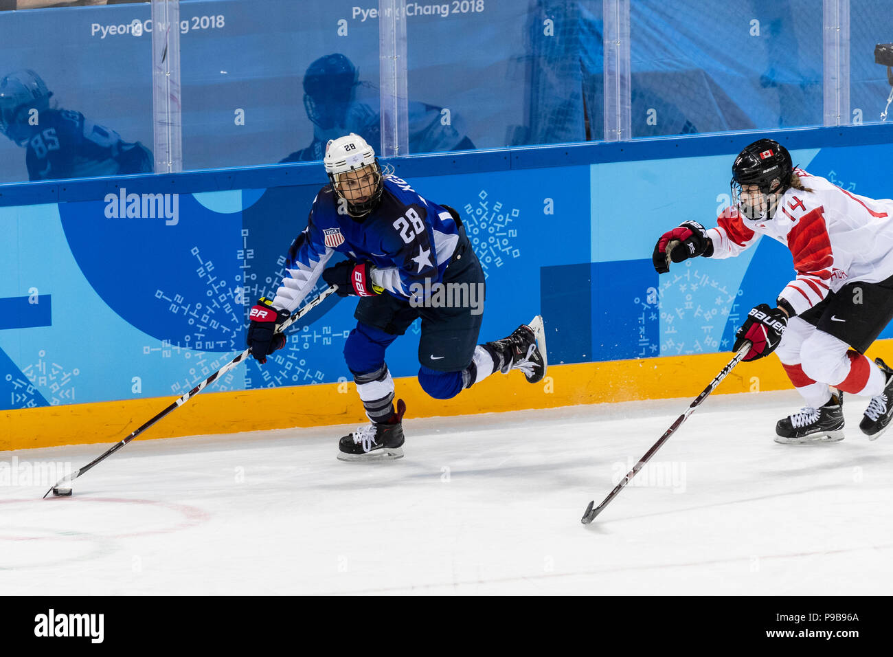 Amanda Kessel (USA) and Renata Fast (CAN) during the Gold medal Women's