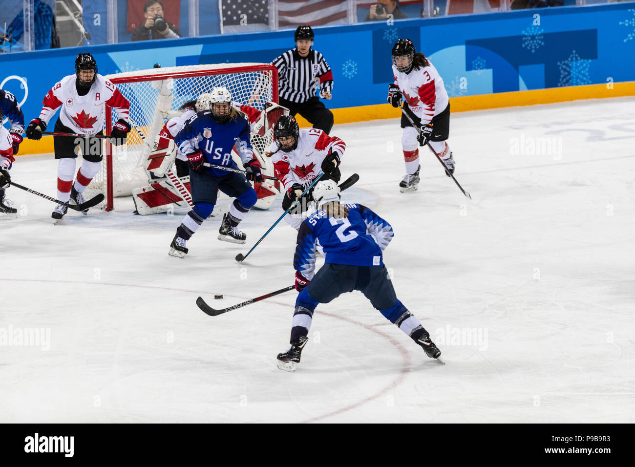 Action during the Gold medal Women's Ice Hockey game USA vs Canada at
