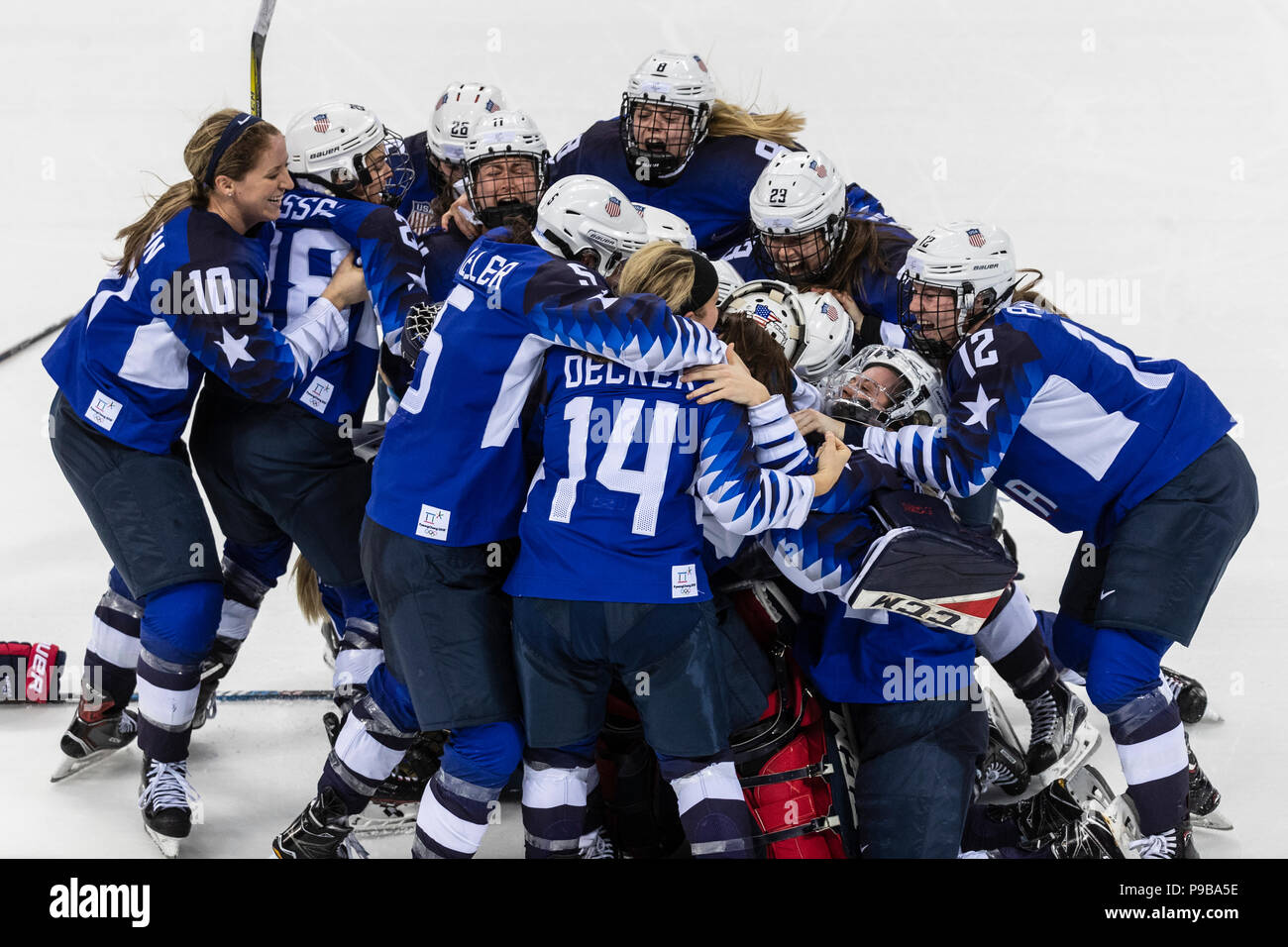 Team USA celebrates winning the Gold medal Women's Ice Hockey game vs