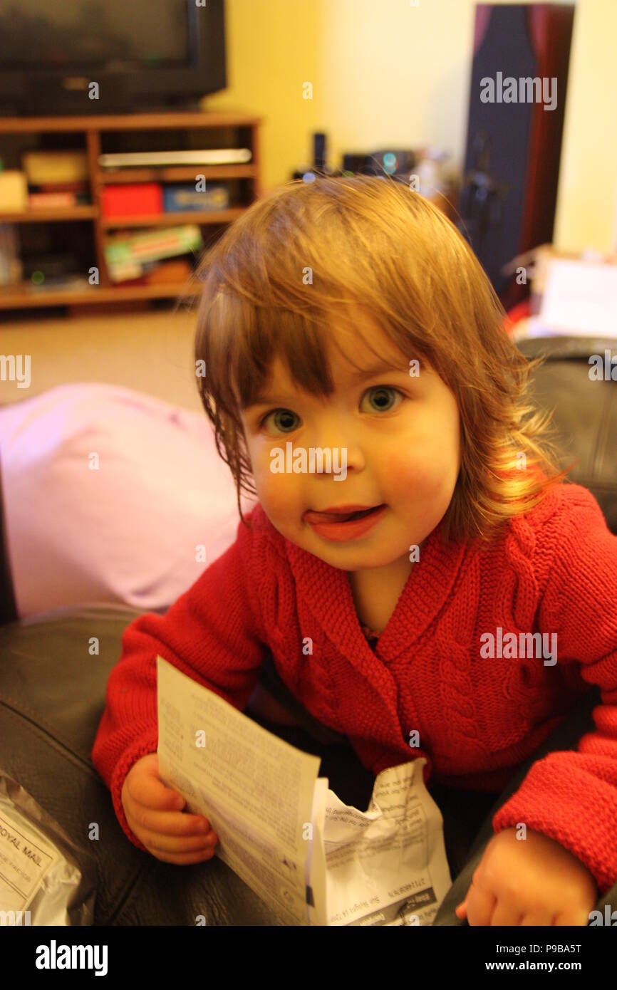 Young girl sticking tongue out hires stock photography and images Alamy