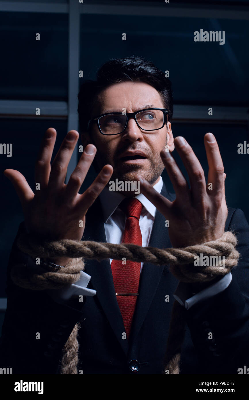 Businessman tied up hires stock photography and images Alamy