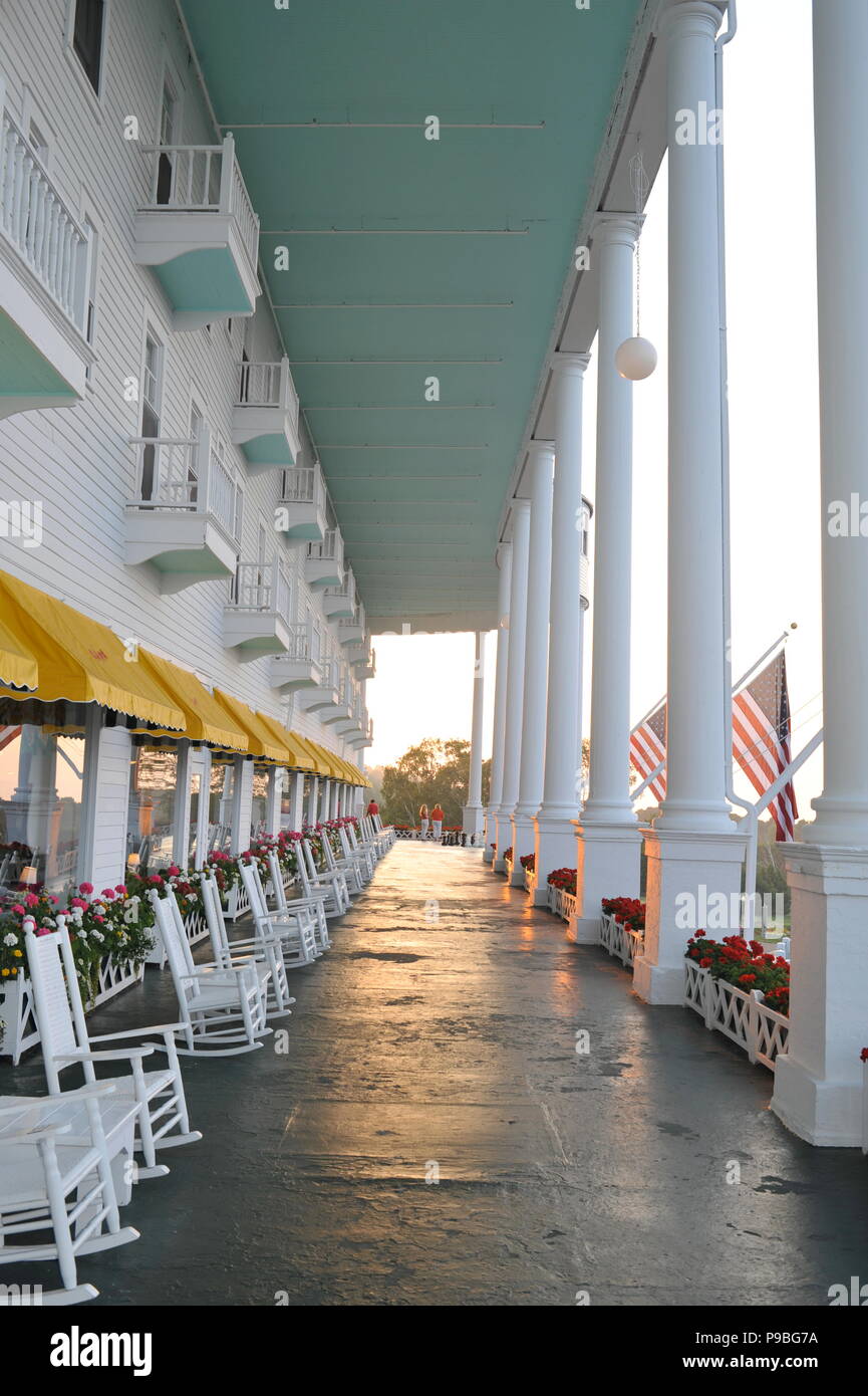 World's longest porch at sunrise at the Historic Grand Hotel on resort island (and state park) of Mackinac Island, Michigan, USA. Stock Photo