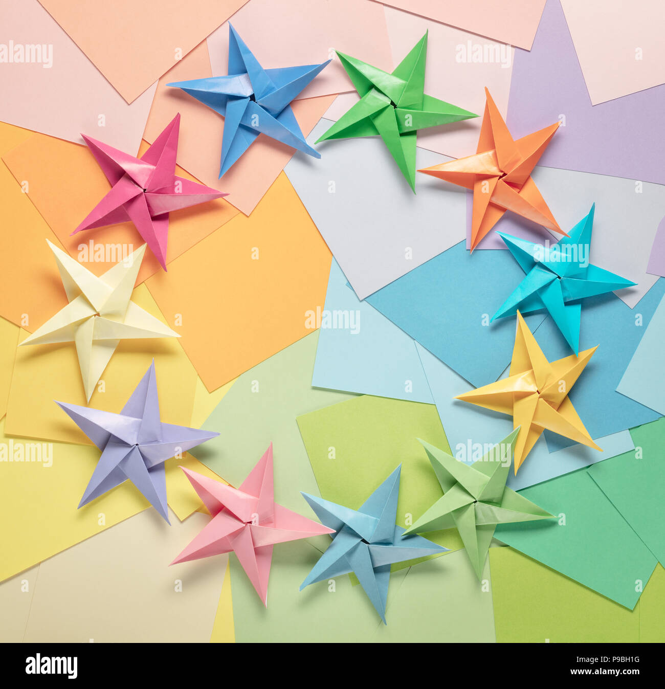 multi-pastel colored paper and paper stars Stock Photo