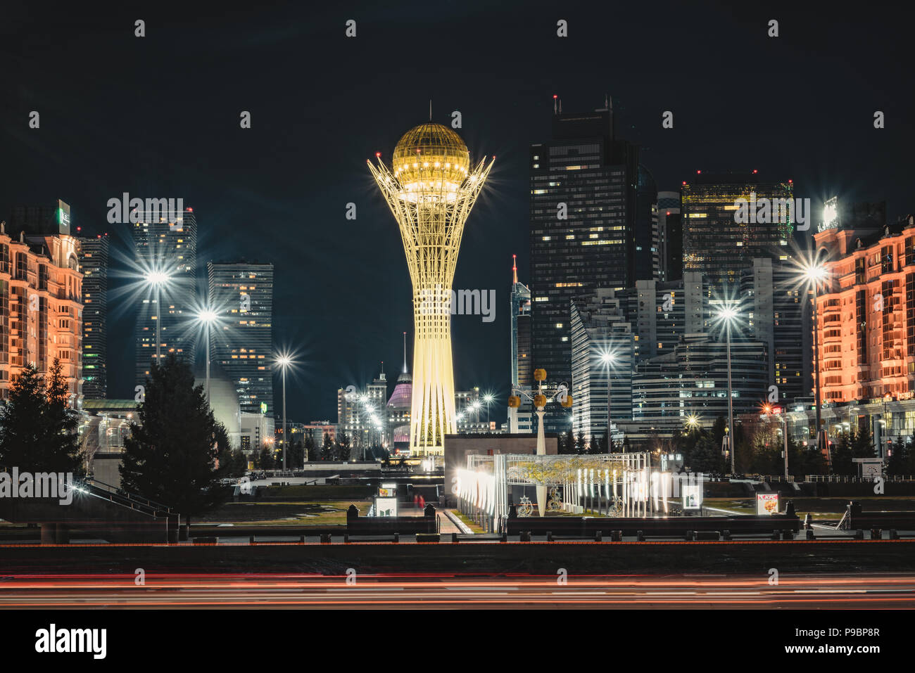 Night view of the Bayterek Tower, a landmark observation tower designed by architect Norman Foster in Astana, the capital of Kazakhstan. Stock Photo