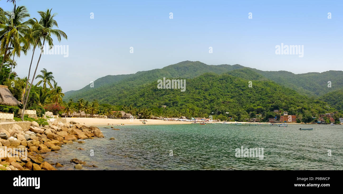 Panorama of Yelapa Beach on a sunny day, one of the most beautiful beaches near Puerto Vallarta, resort town in Mexico on the Pacific coast, in the st Stock Photo