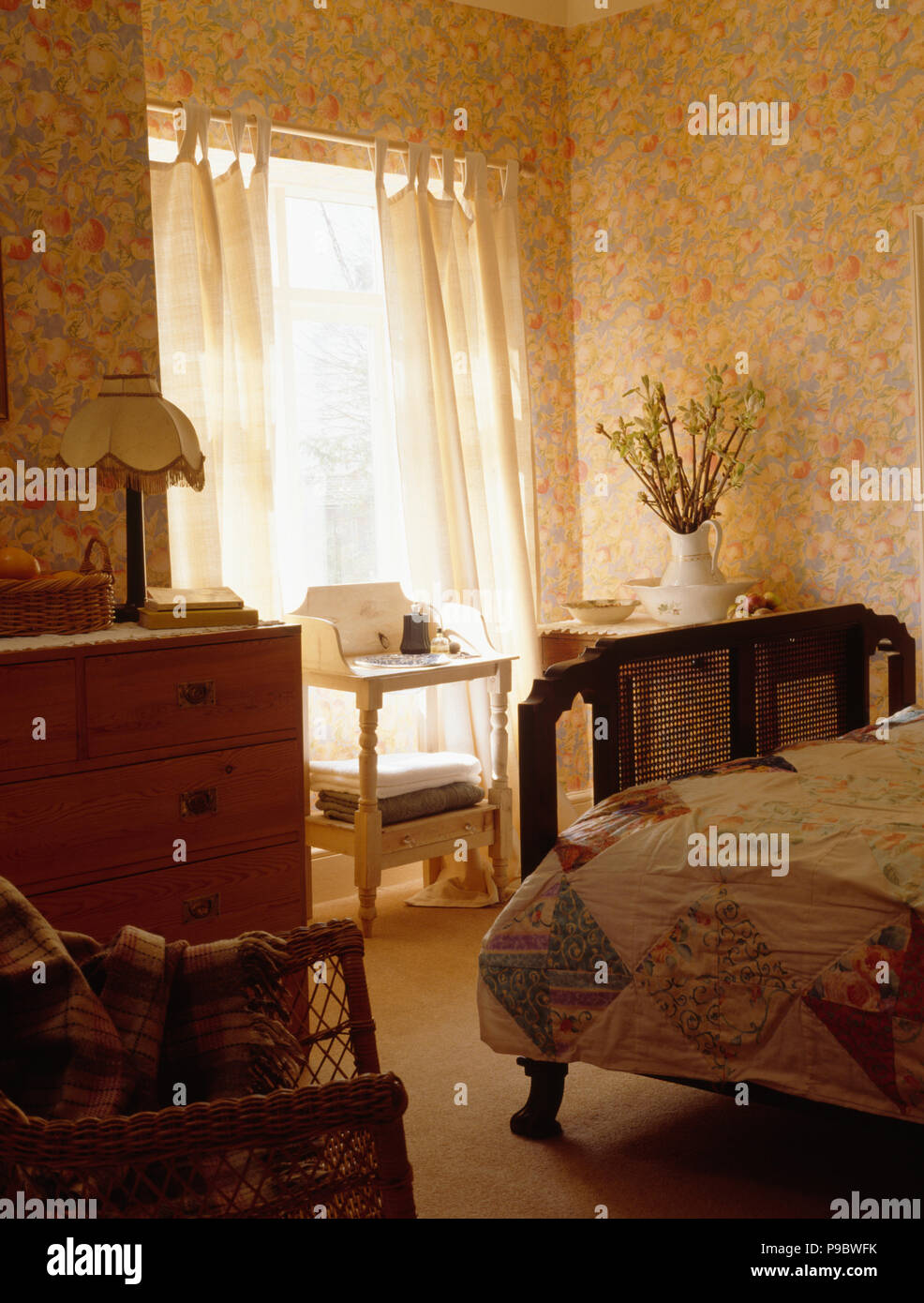 Patterned Wallpaper And Cream Curtains In Nineties Bedroom