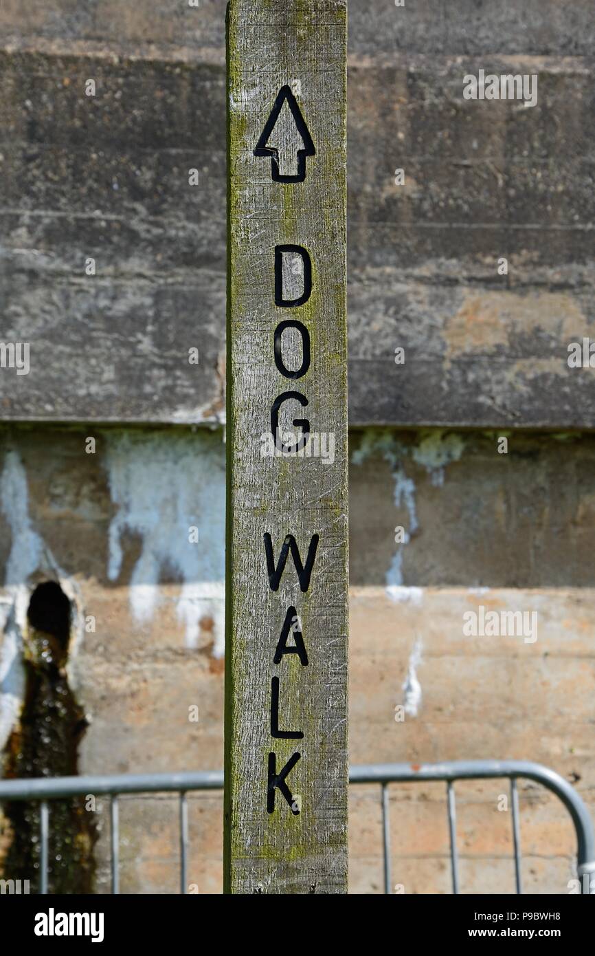 Wooden dog walk sign at the National Memorial Arboretum, Alrewas