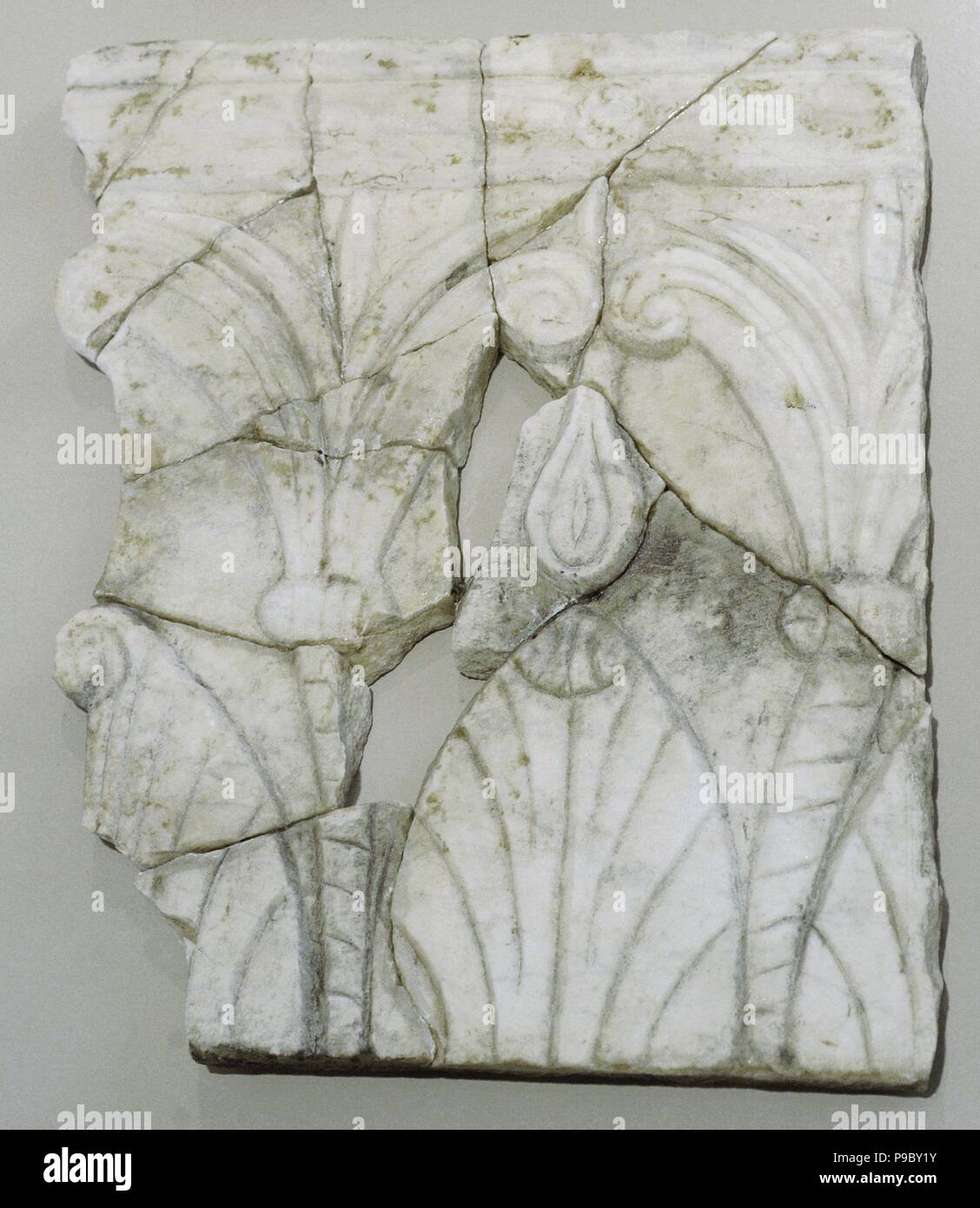 Capital of lesene. 2nd century AD. Capital on marble plaque that was part of the architectural decoration of the residential sector. National Archaeological Museum. Tarragona. Spain. Stock Photo