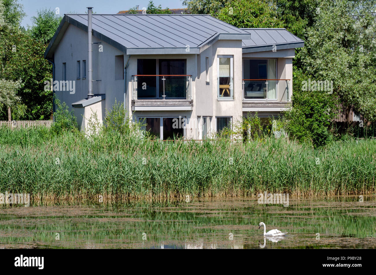 Luxury, lakeside, eco friendly holiday home at Lower Mill Estate in the Cotswold Water Park, Gloucestershire, UK Stock Photo