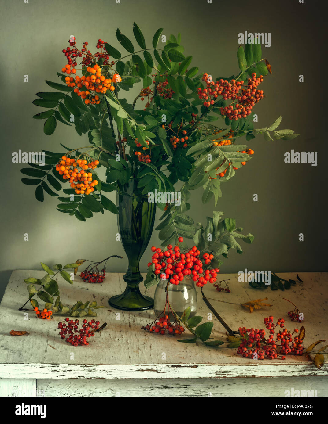 Still life with a bouquet of mountain ash. Vintage. Stock Photo