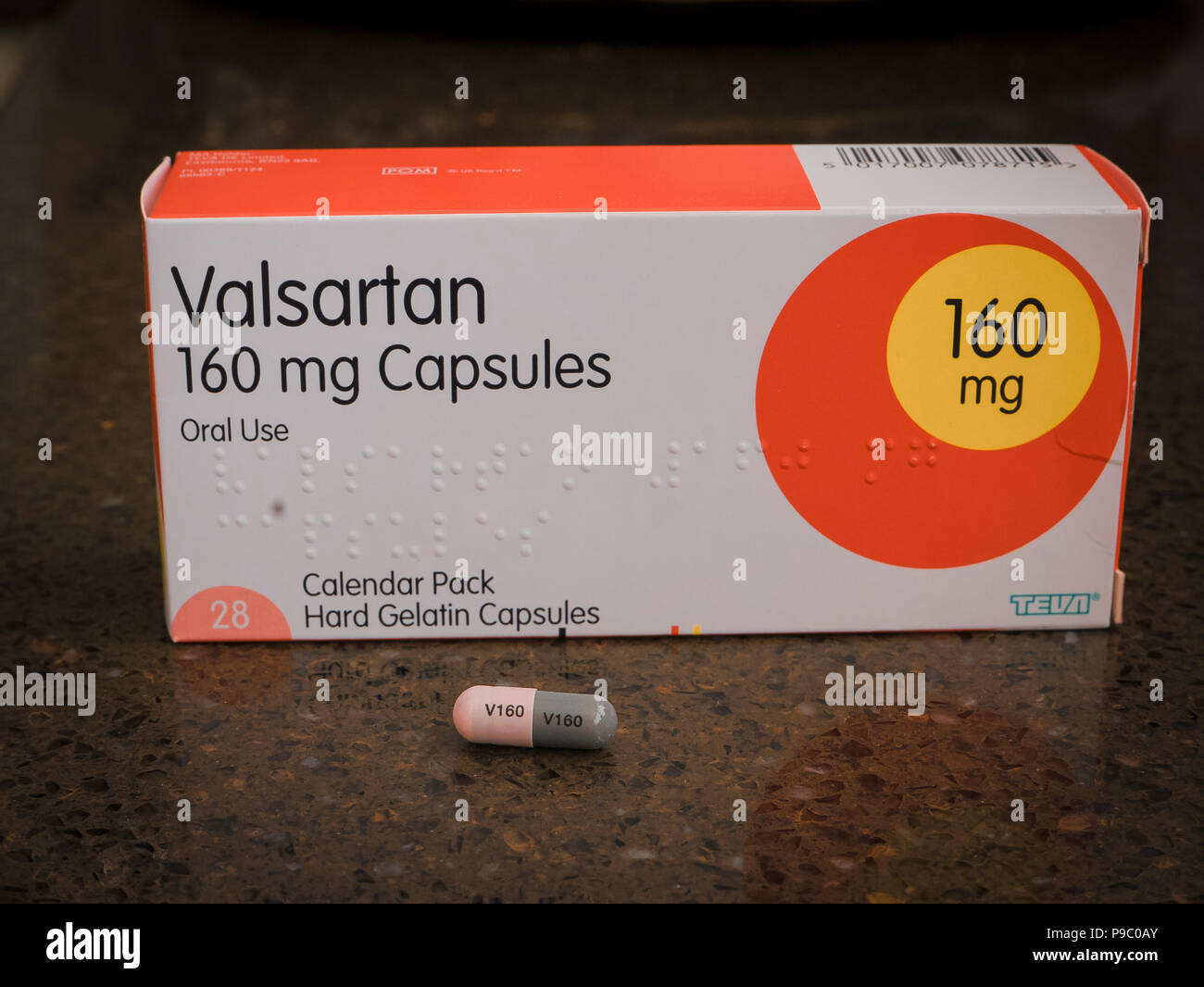 Packet of Valsartin 160 mg capsules showing a single dose of the medicine to control blood pressure in adult patients in UK Stock Photo