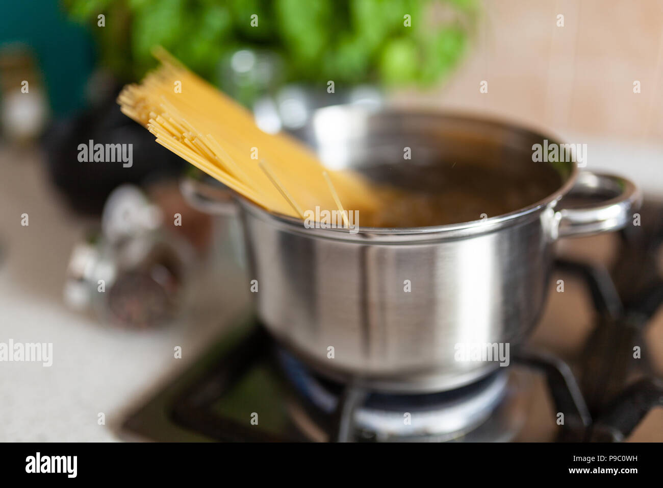 Cooking spaghetti in a pot Stock Photo Alamy