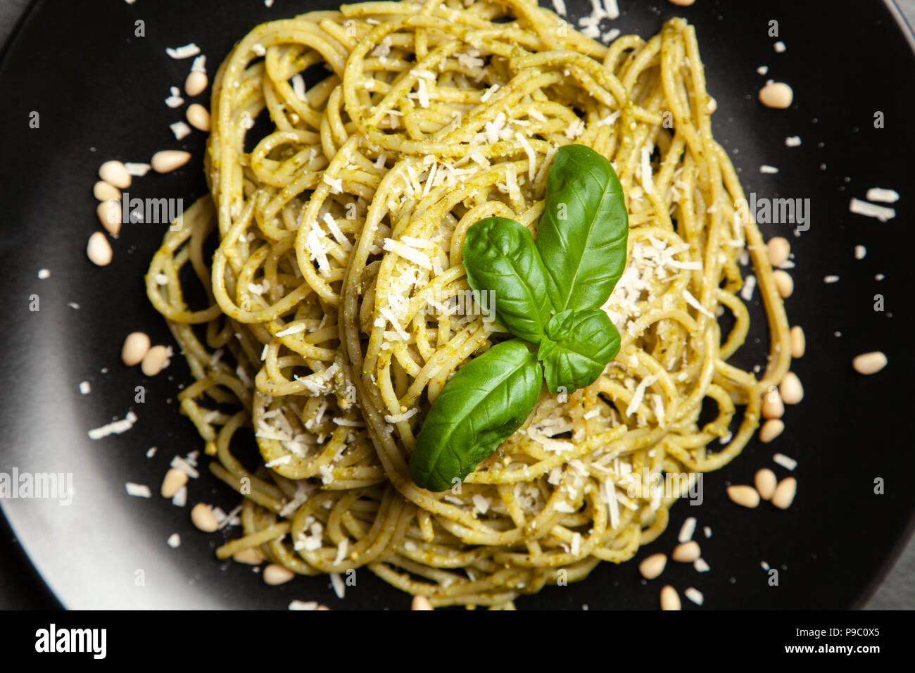 Pasta with pesto sauce Stock Photo