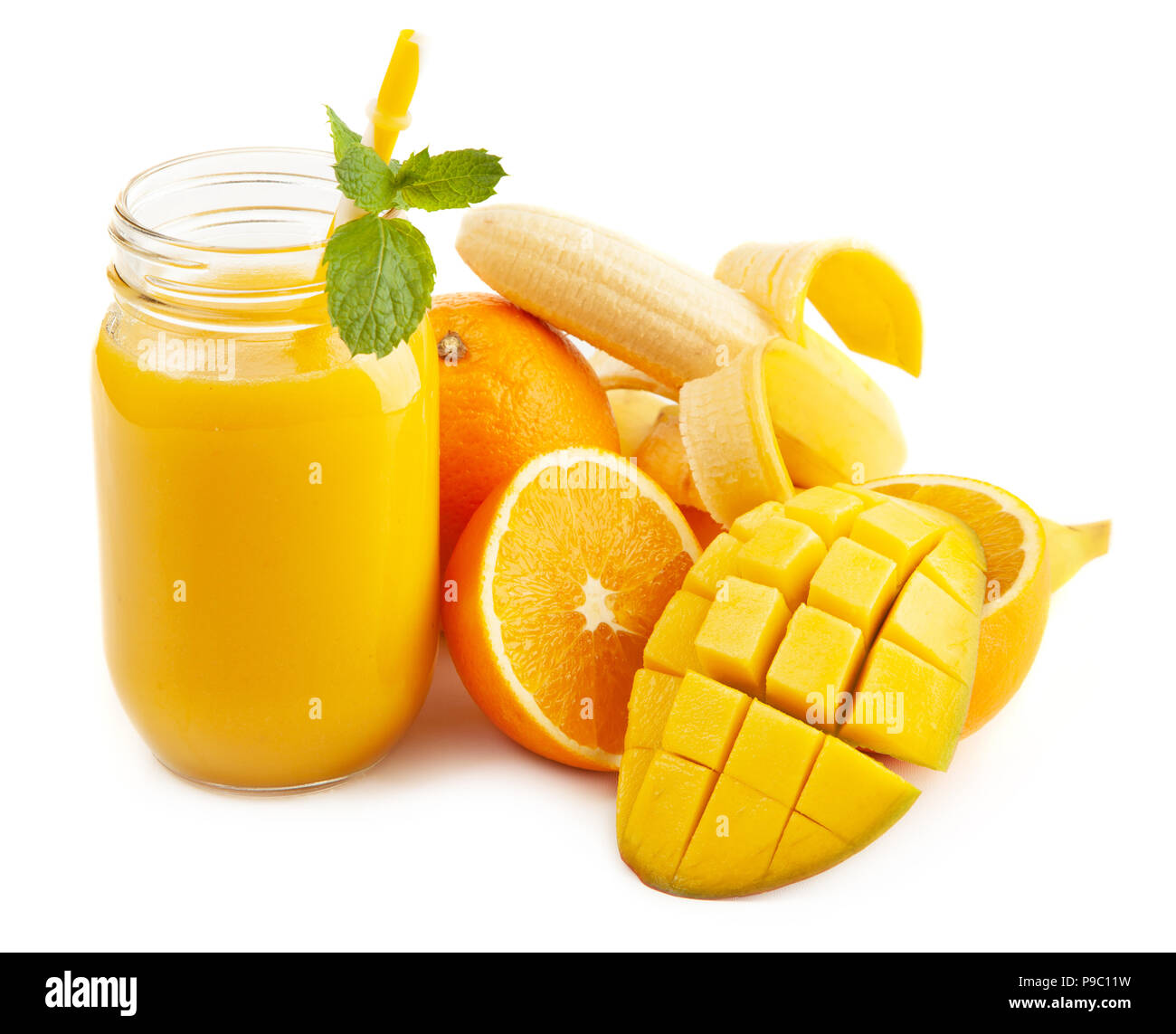 Mango banana orange smoothie Stock Photo - Alamy