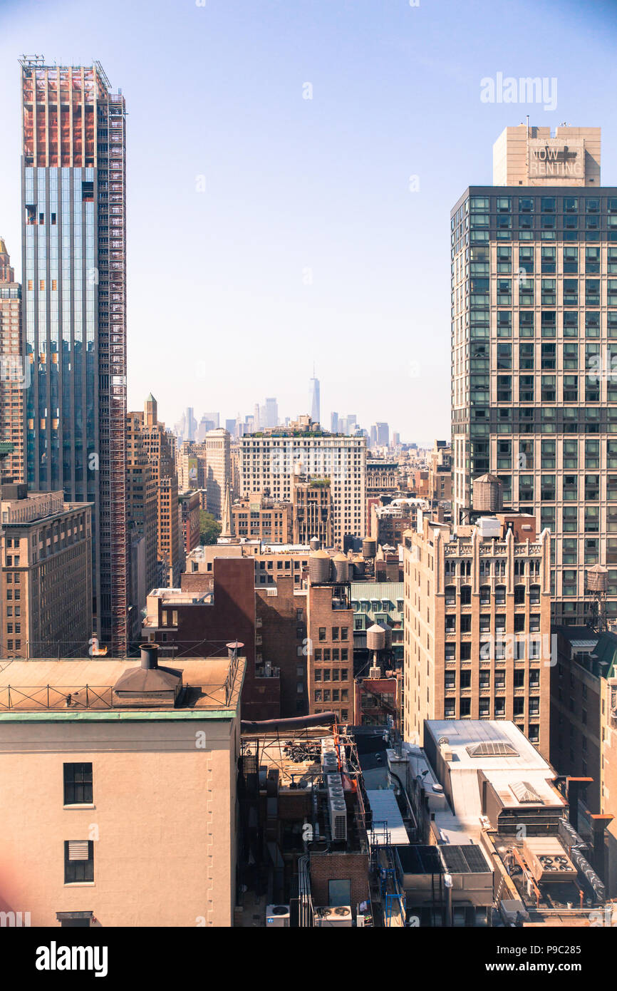 New York City Manhattan cityscape of buildings at midtown on sunny day ...