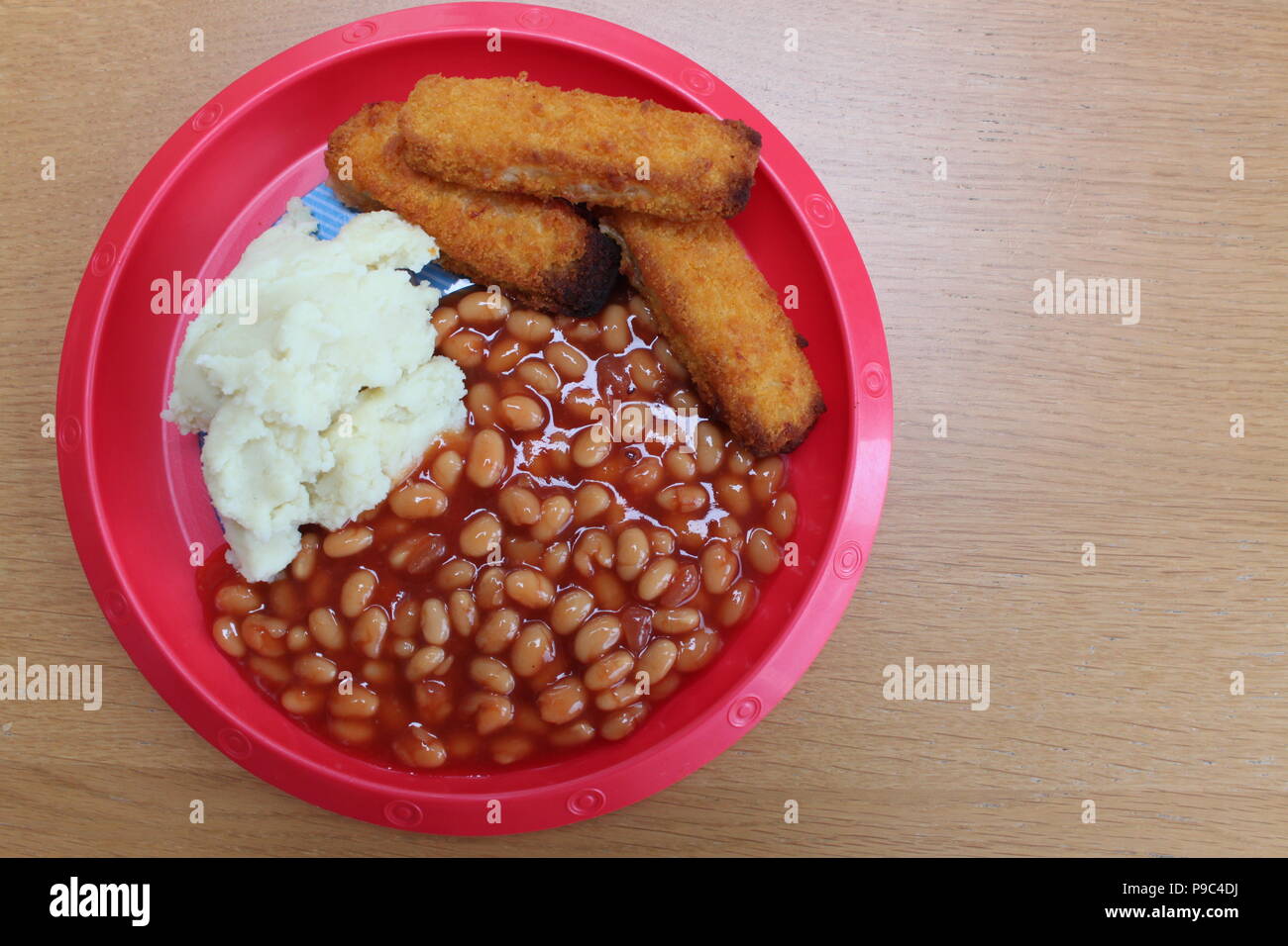 Fish fingers, baked beans and mash potato Stock Photo Alamy