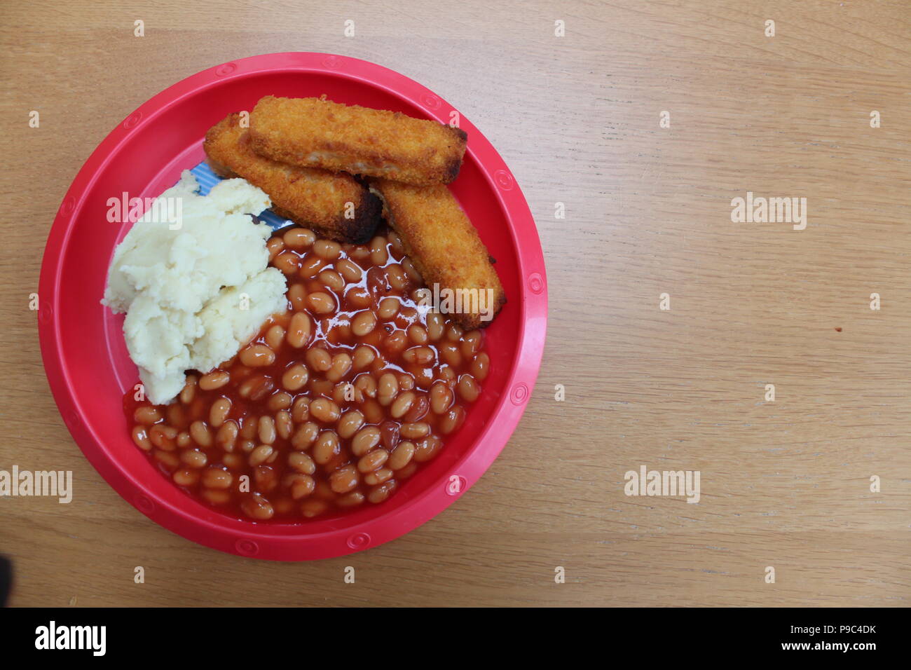 Fish fingers, baked beans and mash potato Stock Photo