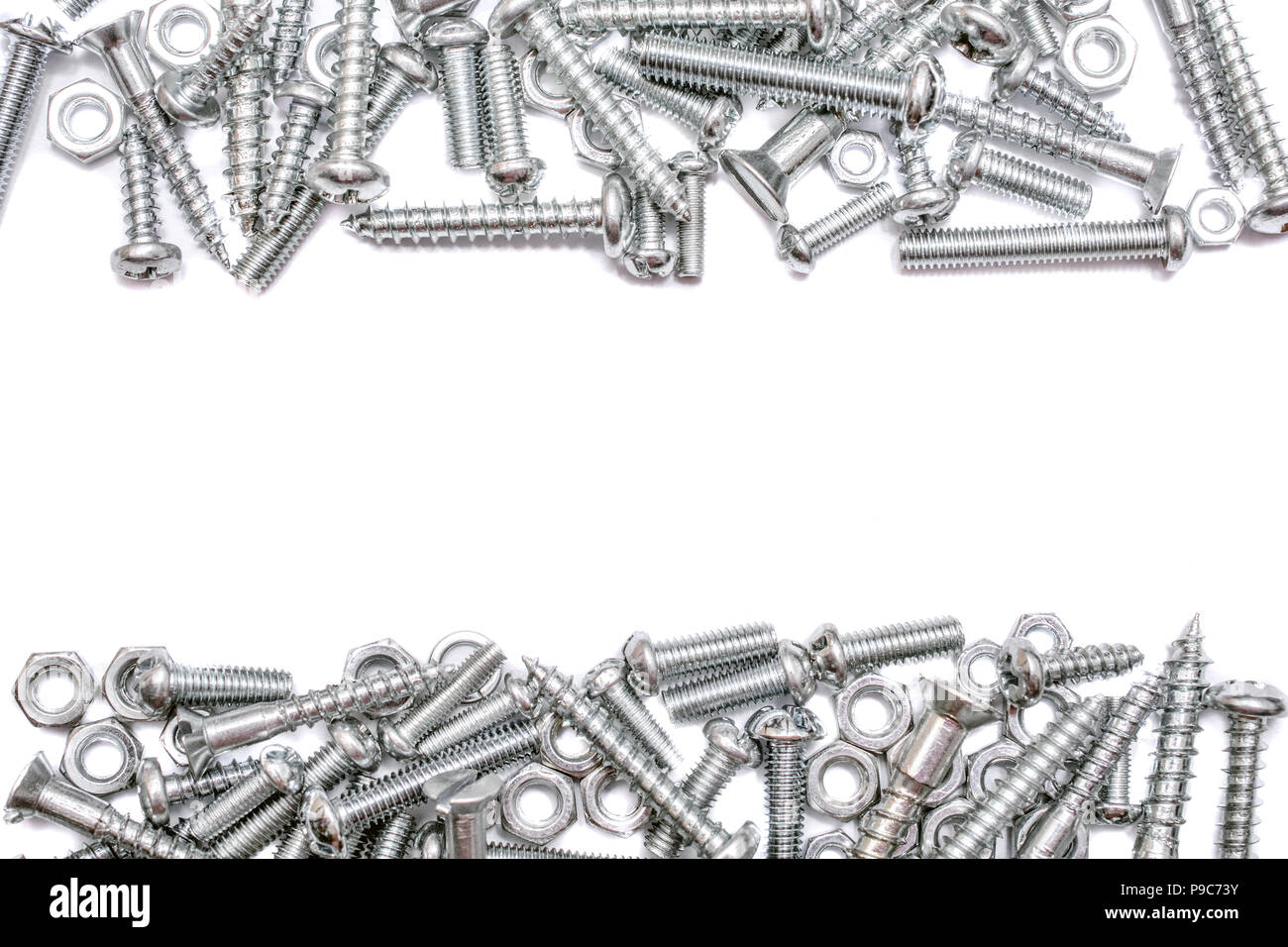 Collection Of Iron Screws, Wood Screws and Bolts With A Free Line For Text In The Middle Stock Photo