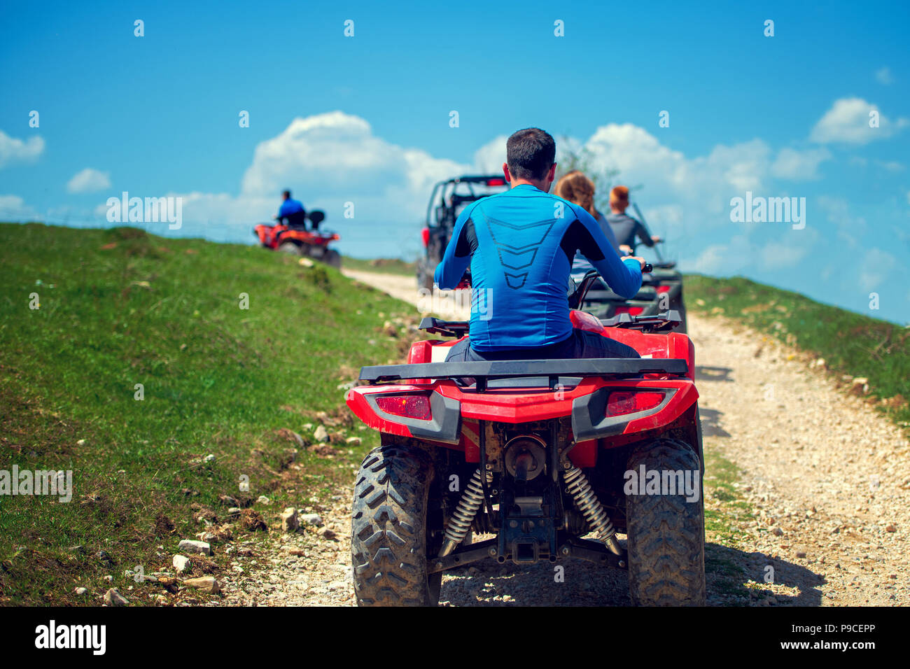 man riding atv vehicle on off road track ,people outdoor sport
