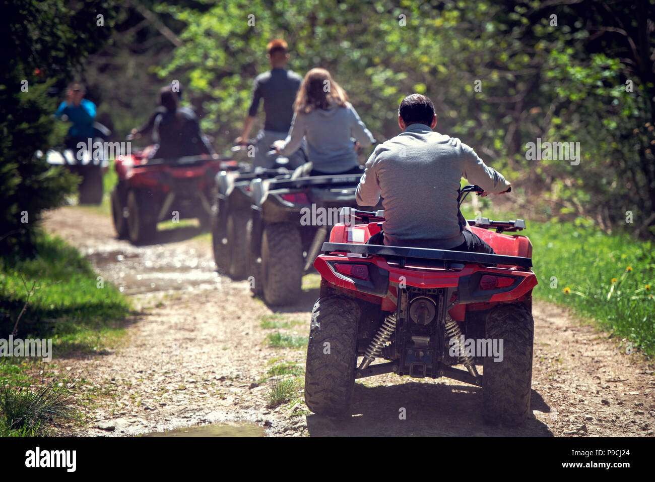 man riding atv vehicle on off road track ,people outdoor sport