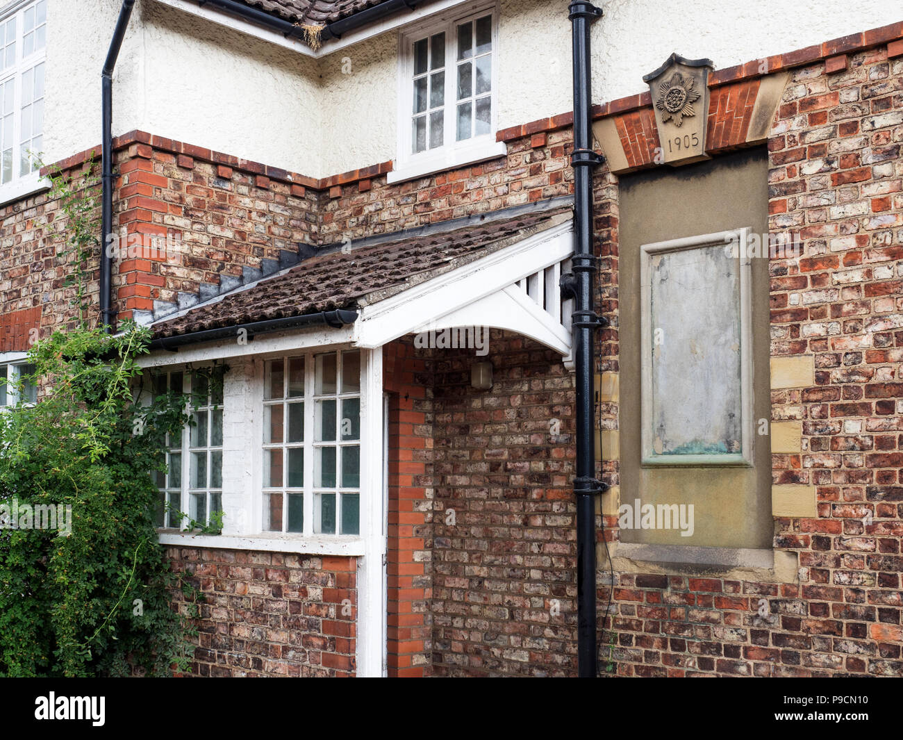 Arts and crafts house built 1905 to home Boer War veterans Main Street Fulford York Yorkshire