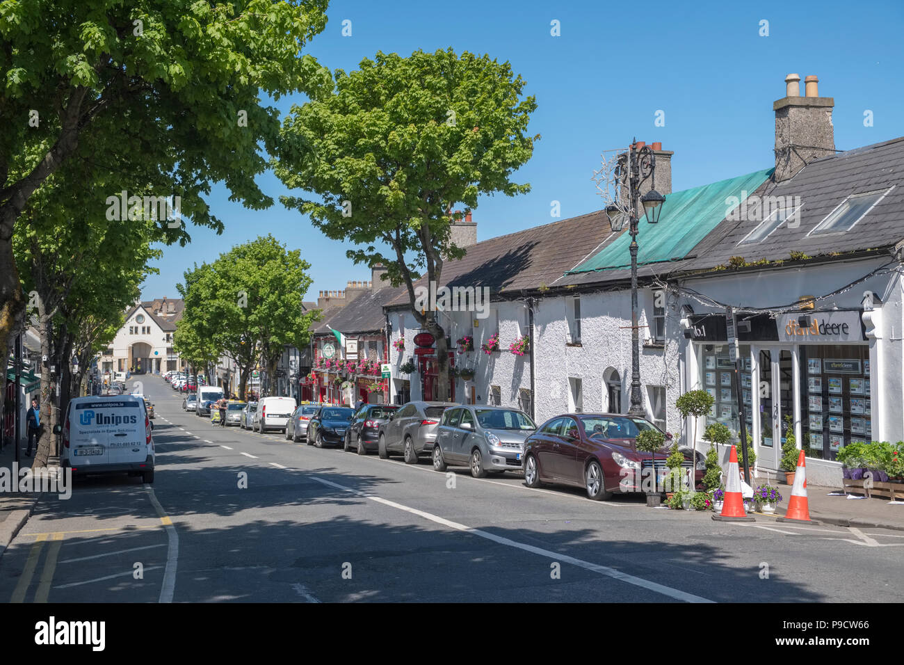 Shopping street in Malahide, a trendy affluent coastal town in Fingal, Leinster, County Dublin, Ireland, Europe Stock Photo