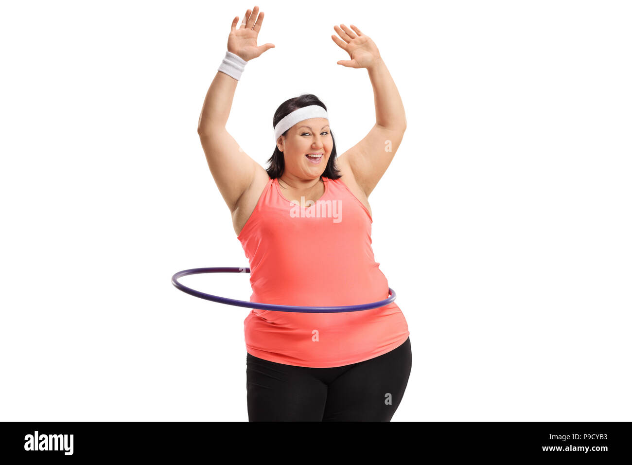 Overweight woman exercising with a hula-hoop isolated on white background Stock Photo