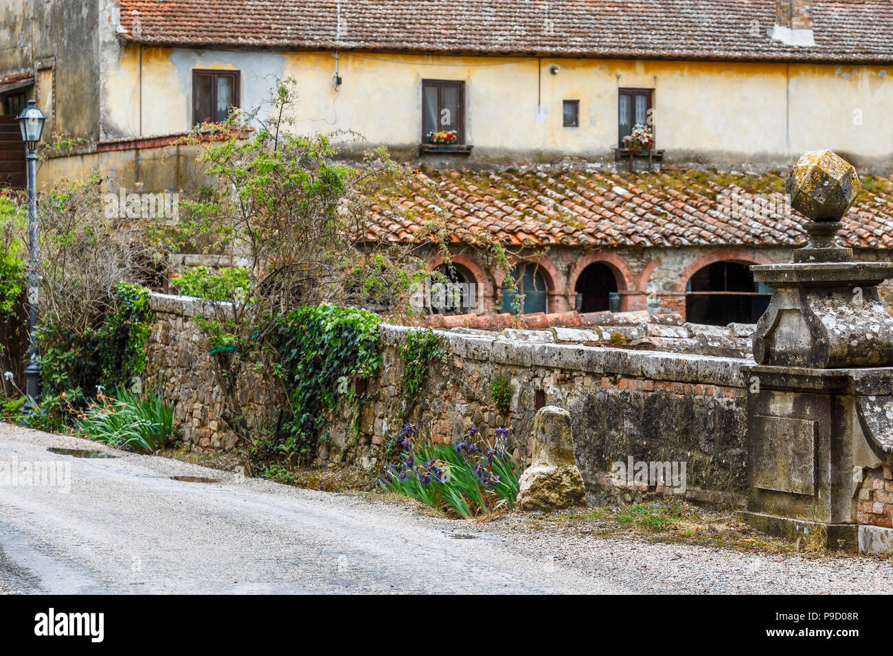 Italian villa on a road in the countryside Stock Photo