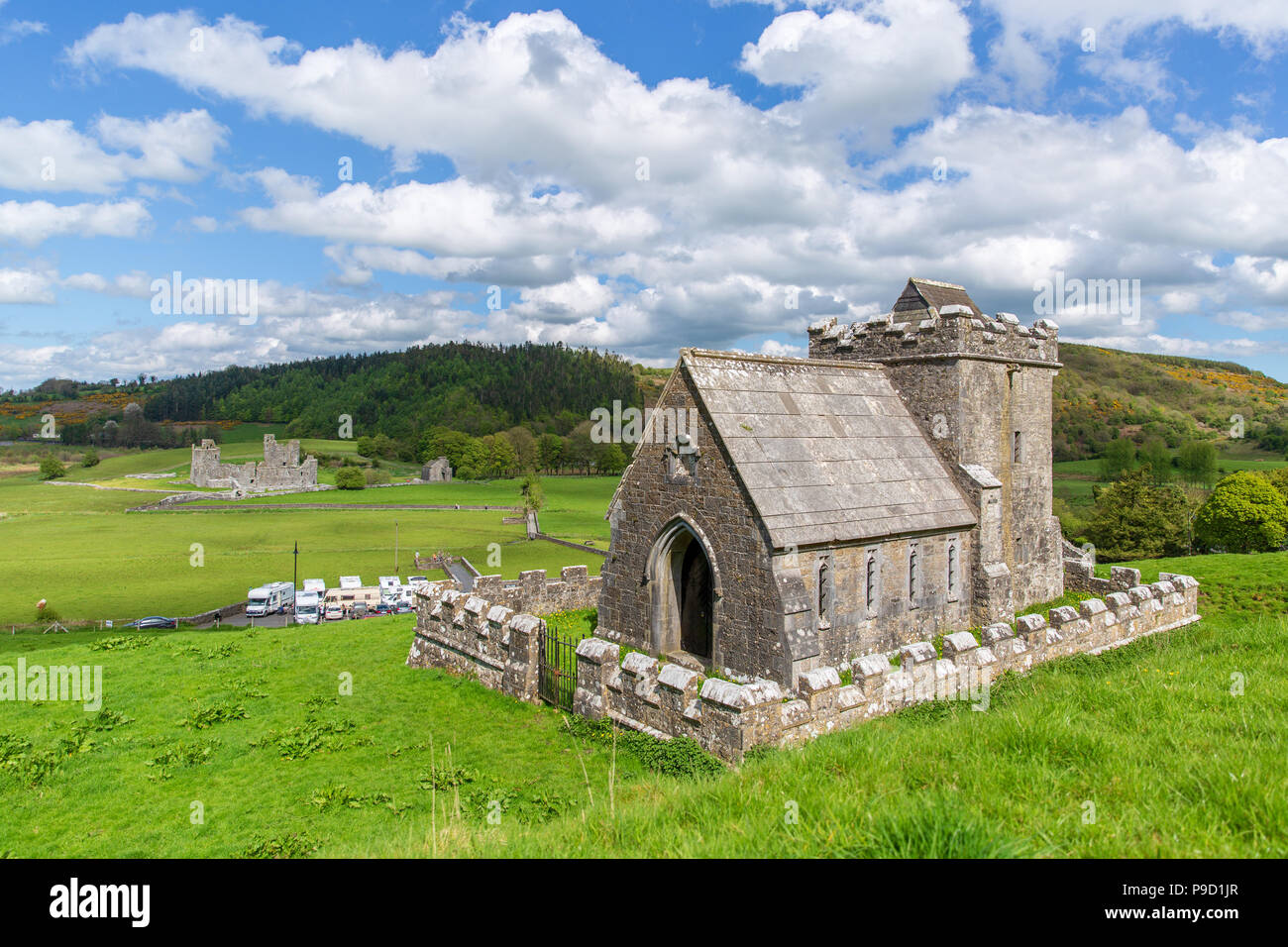 Historic valley in Fore village with Church and The Anchorite’s Cell in the foreground and the ruins of Benedictine monastery Fore Abbey at the back Stock Photo